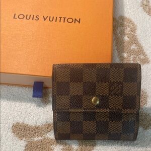 Louis Vuitton “Elise Trifold” Damier Ebene print. Wallet is ***Discontinued***
